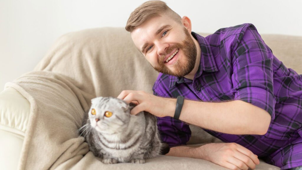 person loving a cat